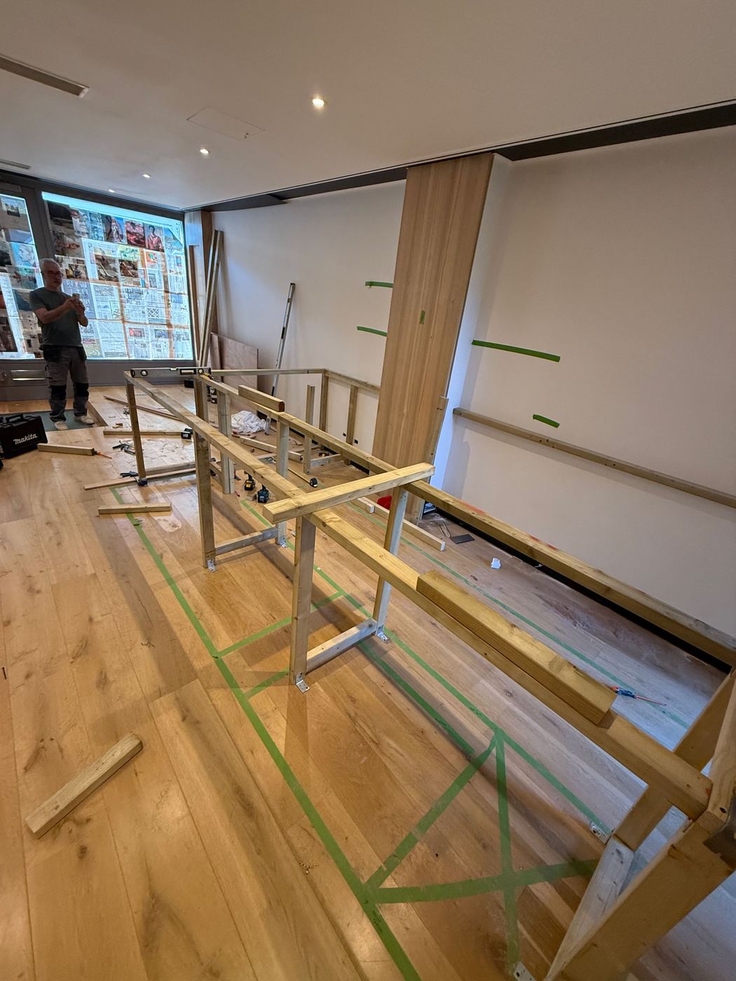 The timber frame of the coffee bar going up on East Hill